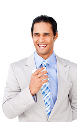 Confident businessman holding a drinking cup