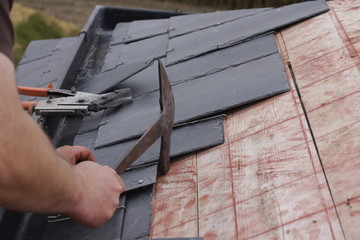 roofer made a roof with slates