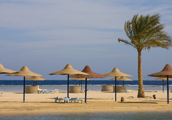 Beach on a sunny day. Hurghada city in Egypt.