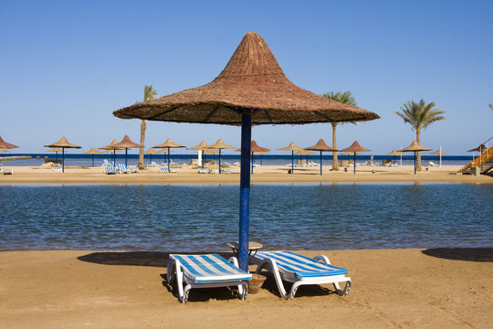 Beach on a sunny day. Hurghada city in Egypt.