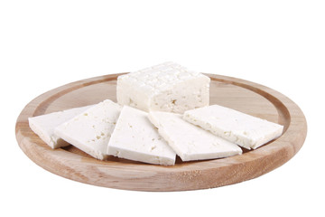 sliced white cheese on plate