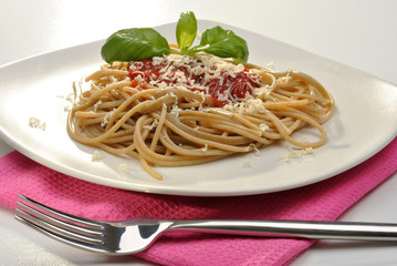 home made pasta with mince sauce and basil