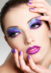 Beautiful  female face with fashion  make-up of eyes