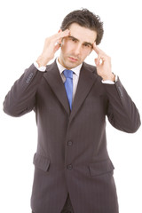 Young business man with a headache, isolated on white