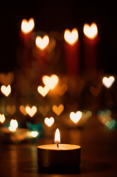 Candles and heartshaped bokeh