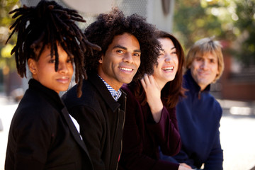 Diverse Group of Four Friends Relaxing Together