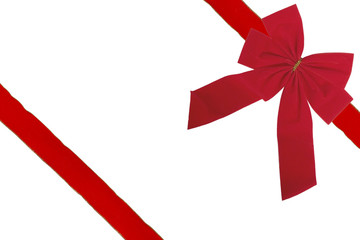 Red velvet ribbon and bow isolated on white
