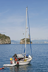 Sailing yacht in a Pacific Ocean bay