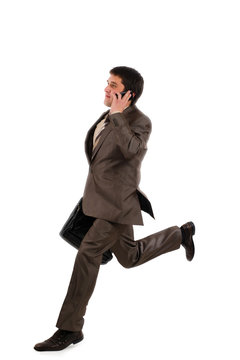 Business Man Running With A Briefcase And Speaking By Phone