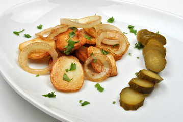 roasted potato with organic onion and gherkin