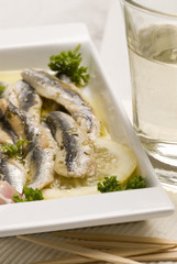Spanish tapas. Marinated fresh anchovies. Boquerones en vinagre.
