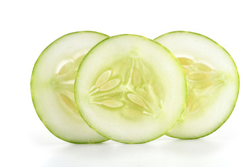 Cucumber slices on white