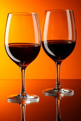 Two glasses of red wine.