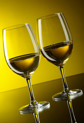 Two glasses of white wine.