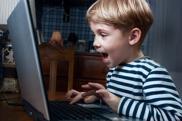 boy playing computer game