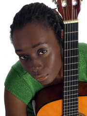 Pretty young black woman holding accustical guitar