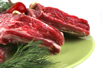 beef rib's on dish with greenery