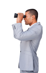 Confident businessman using binoculars