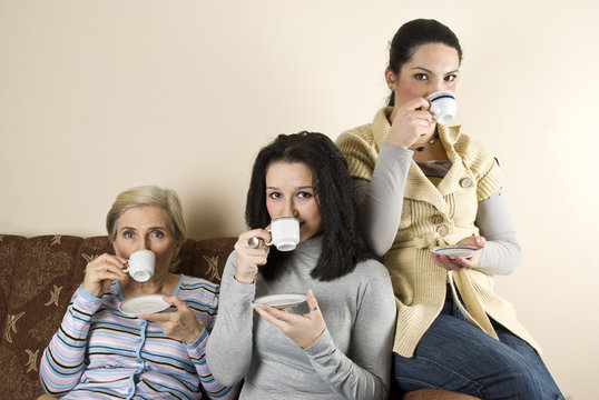 Three Women Friends Drinking Coffee