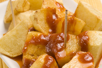 Spanish tapas. Bold potatoes in hot sauce. Patatas bravas.