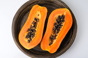 papaya in wooden tray