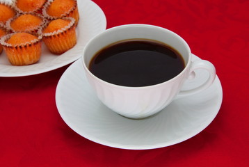 Coffee cup over red background