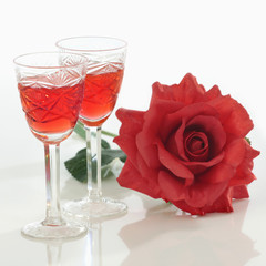 two glasses and rose