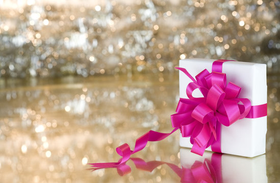 Present with pink ribbon