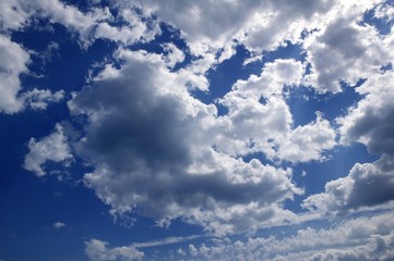 Blue beautiful sky with white clouds  in sunny day