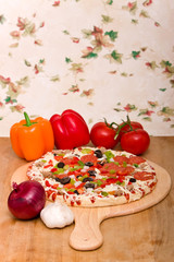Fresh italian pizza and vegetables