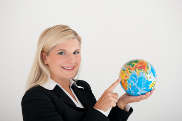 young business woman with a globe