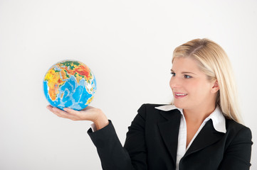 young business woman with a globe