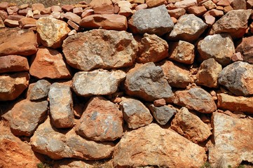 Golden masonry stone wall from old building