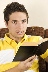 Young man with book