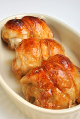 roasted delicious chicken olive in a white bowl
