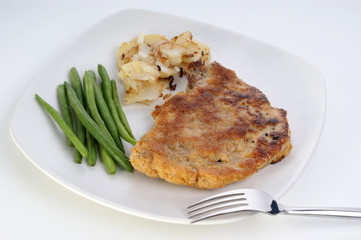 cutlet with organic beans and roasted potato