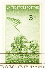 the raising of the flag on Mt Surabachi on Iwo Jima 1945