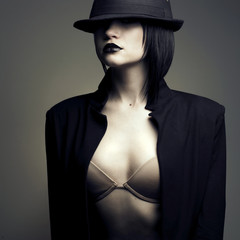Portrait of beautiful stylish woman in hat