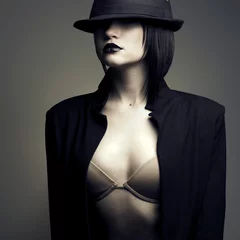 Fotobehang Portrait of beautiful stylish woman in hat © Egor Mayer