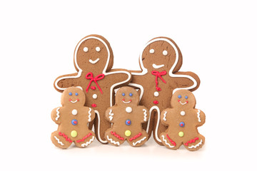 Five Gingerbread People Against a White Background