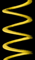 Yellow spring on black background