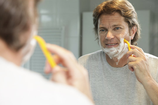 Middle Age Man Shaving