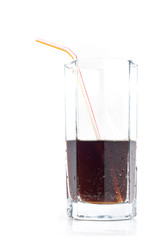 glass with a drink and a straw