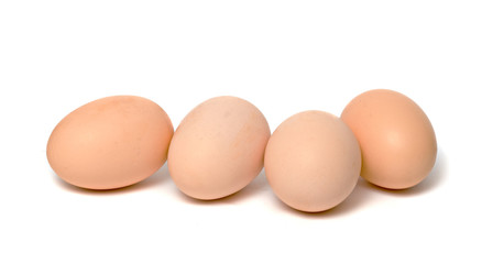 Four eggs isolated on white background