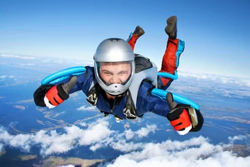 Fotobehang Skydiver falls through the air © 2happy