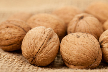 walnuts laying on jute