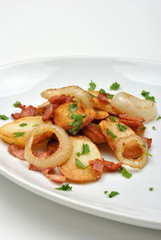 roasted potato with organic onion on a plate