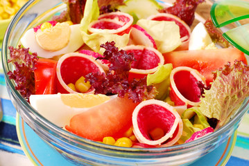 fresh salad with salami,eggs and vegetables