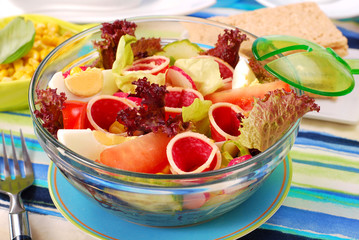fresh salad with salami,eggs and vegetables