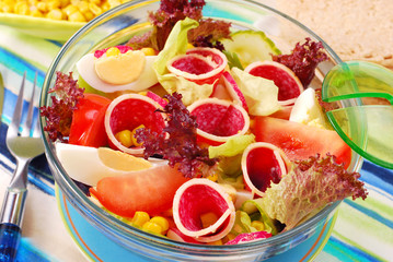 fresh salad with salami,eggs and vegetables